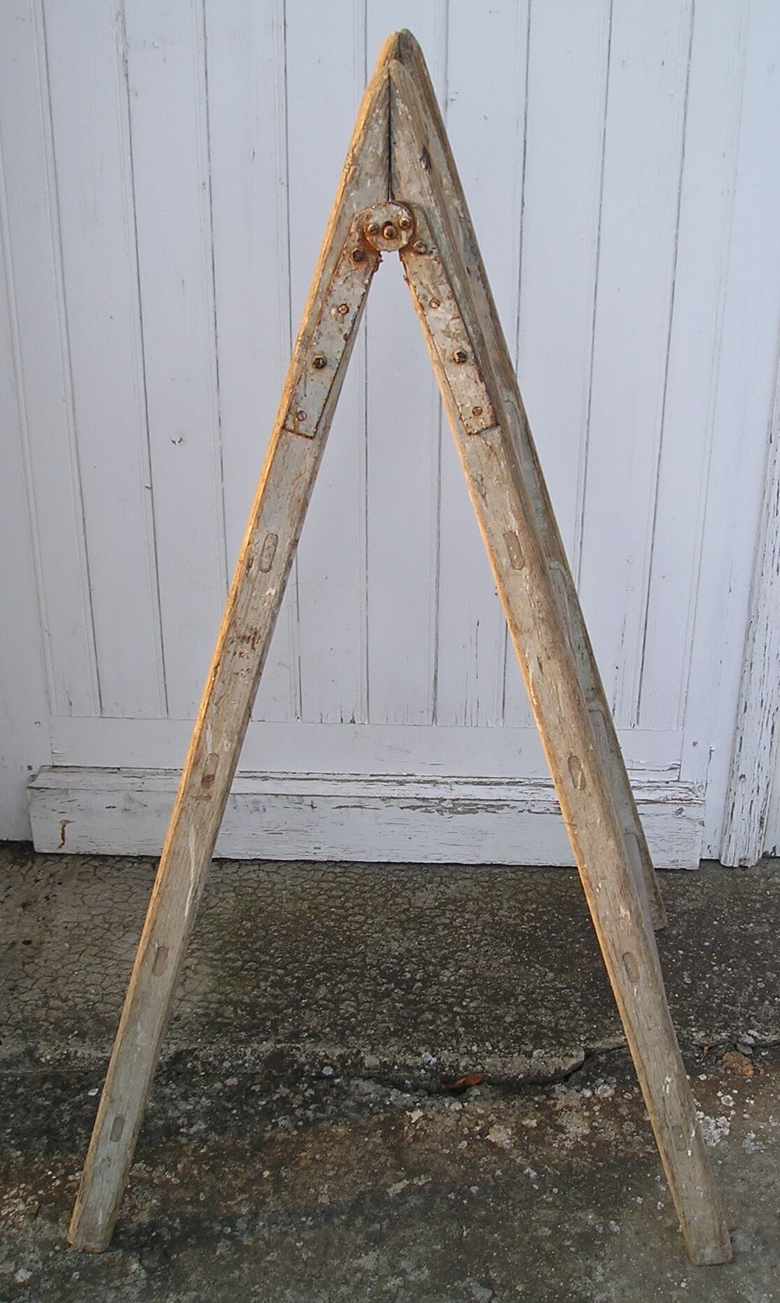 Old wooden painter ladder