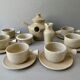 Coffee or tea service, in sandstone, signed the Argonauts, 60s