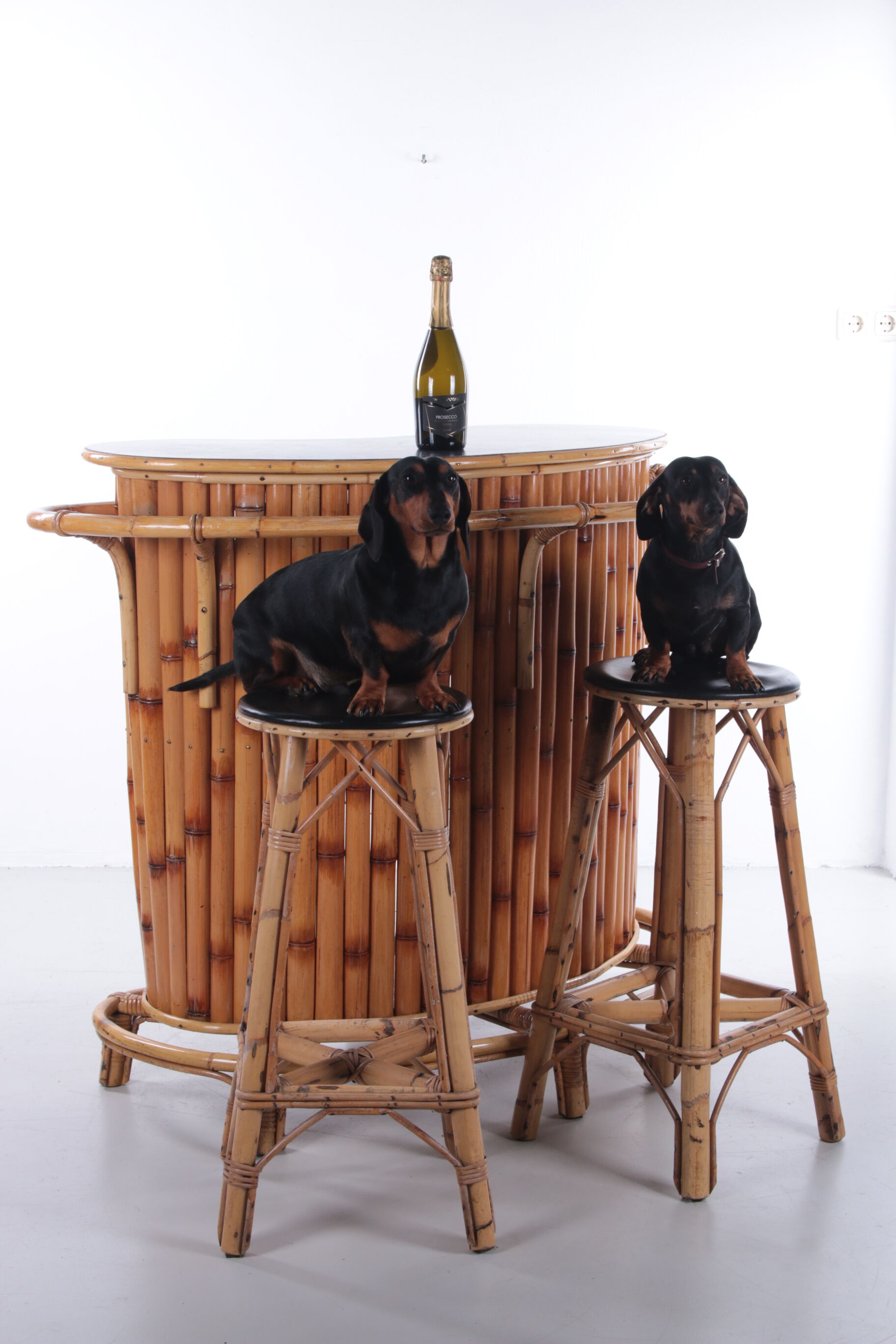 Vintage bamboo Tiki bar cocktail bar with 2 bar stools.