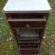 Walnut and walnut veneer bedside table with marble around 1900, door with drawers