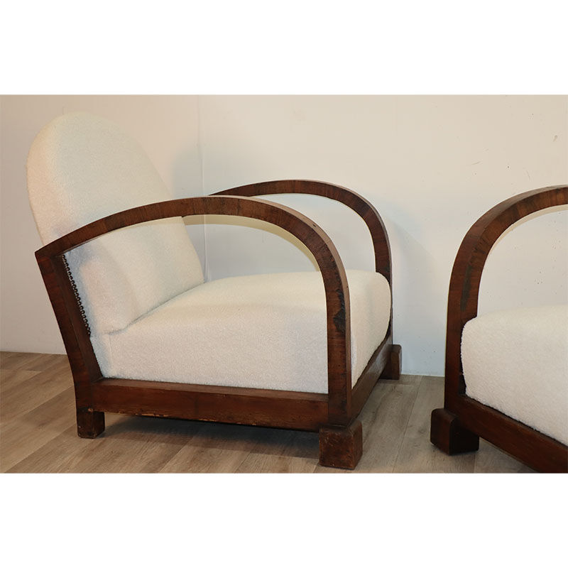 Pair of modernist armchairs in wood and buckle fabric, 1940