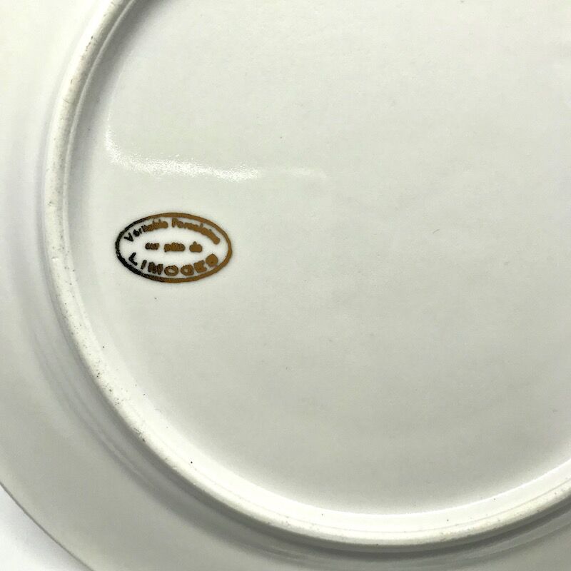 12 flat plates made of Limoges porcelain