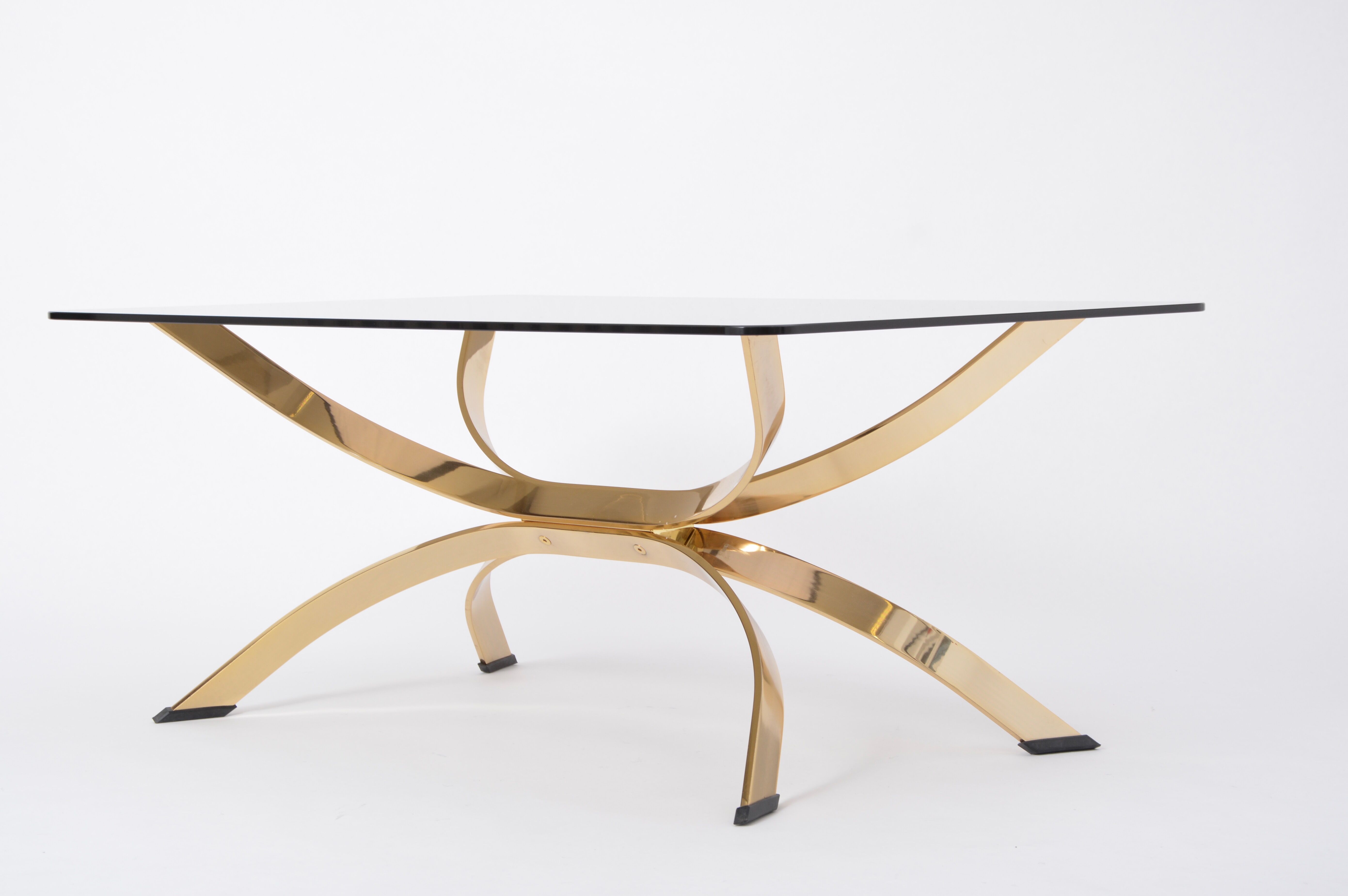 Gold Colored Mid-Century Modern coffee table with smoked Glass top