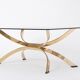 Gold Colored Mid-Century Modern coffee table with smoked Glass top