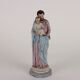 Ancient sculpture of Saint Joseph in a display case, Italy 1900s, polychrome porcelain.
