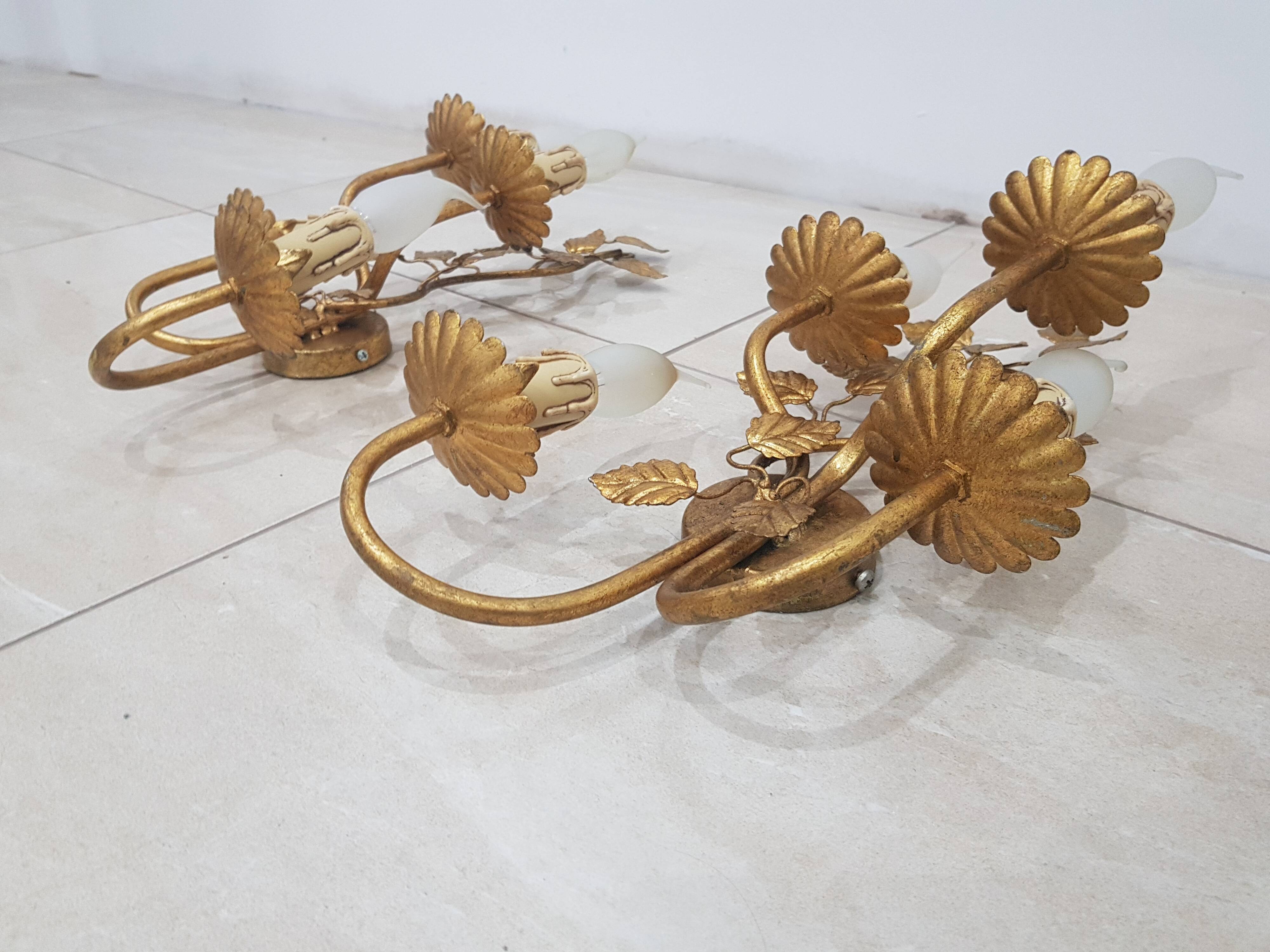 A pair of wall lamps / Coco Chanel / Hollywood Regency / France, 1960s