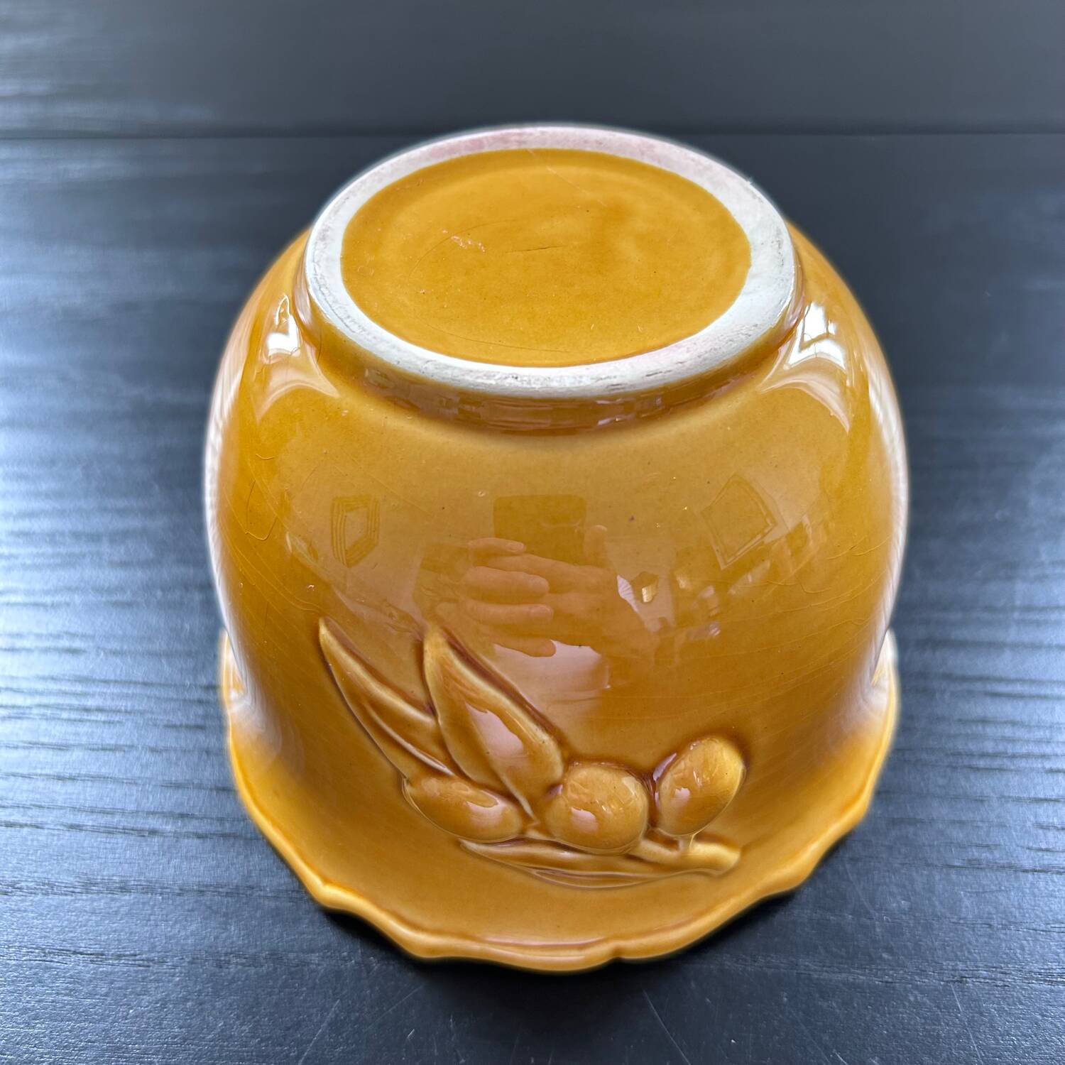 Scalloped bowl with olive decoration