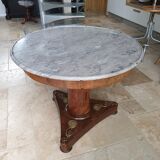 Pedestal table above marble