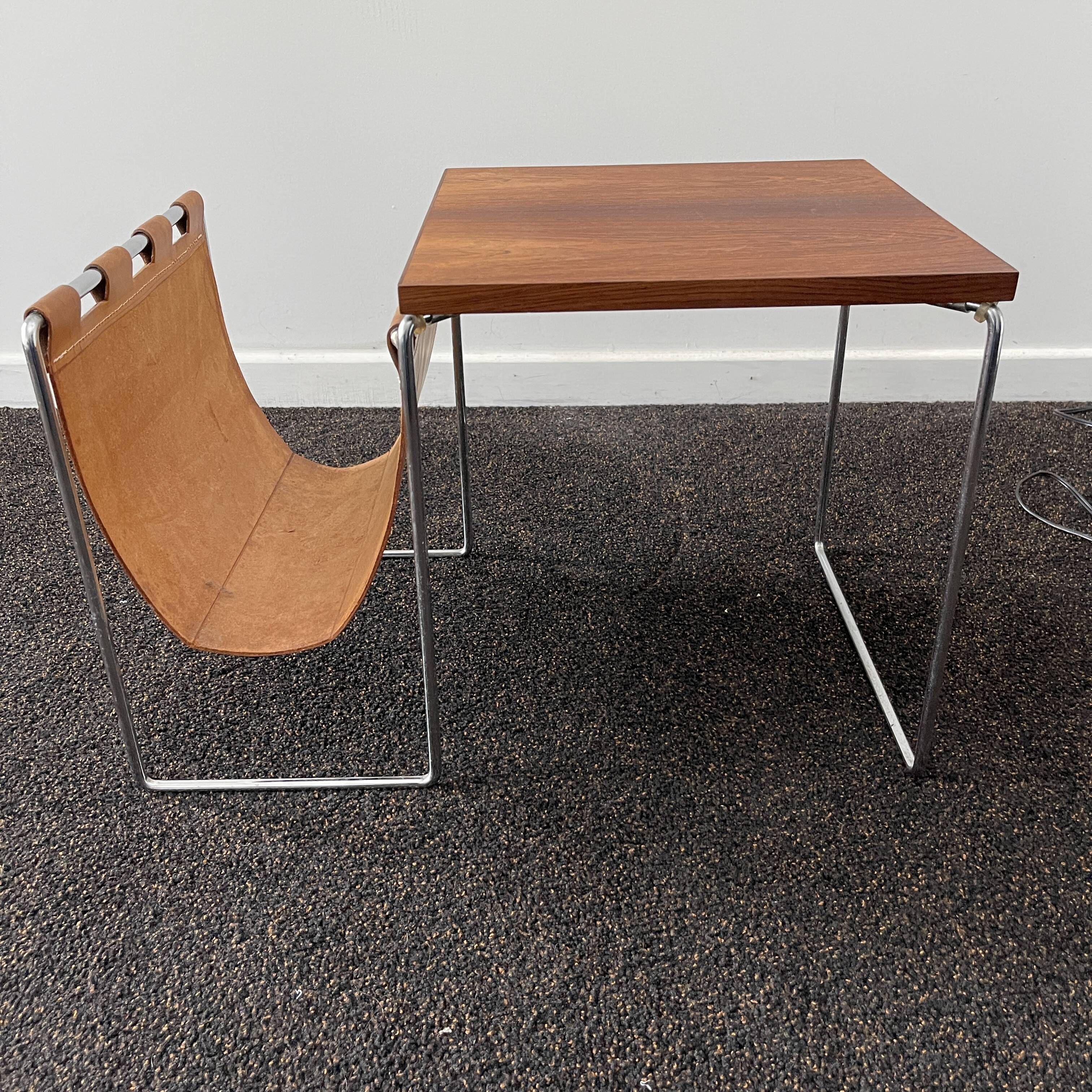 Vintage side table / newspaper holder in leather, chrome-plated steel rosewood, ca 1970