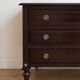 Antique Louis XVI commode in brown wood and gilded brass.