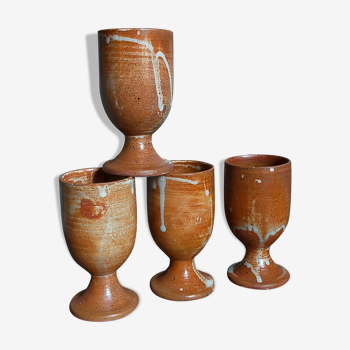 Quatre mugs de potier tournés en grès clair vintages