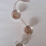 4-light silver metal candle holder