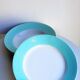 Lot of 4 green and white plates