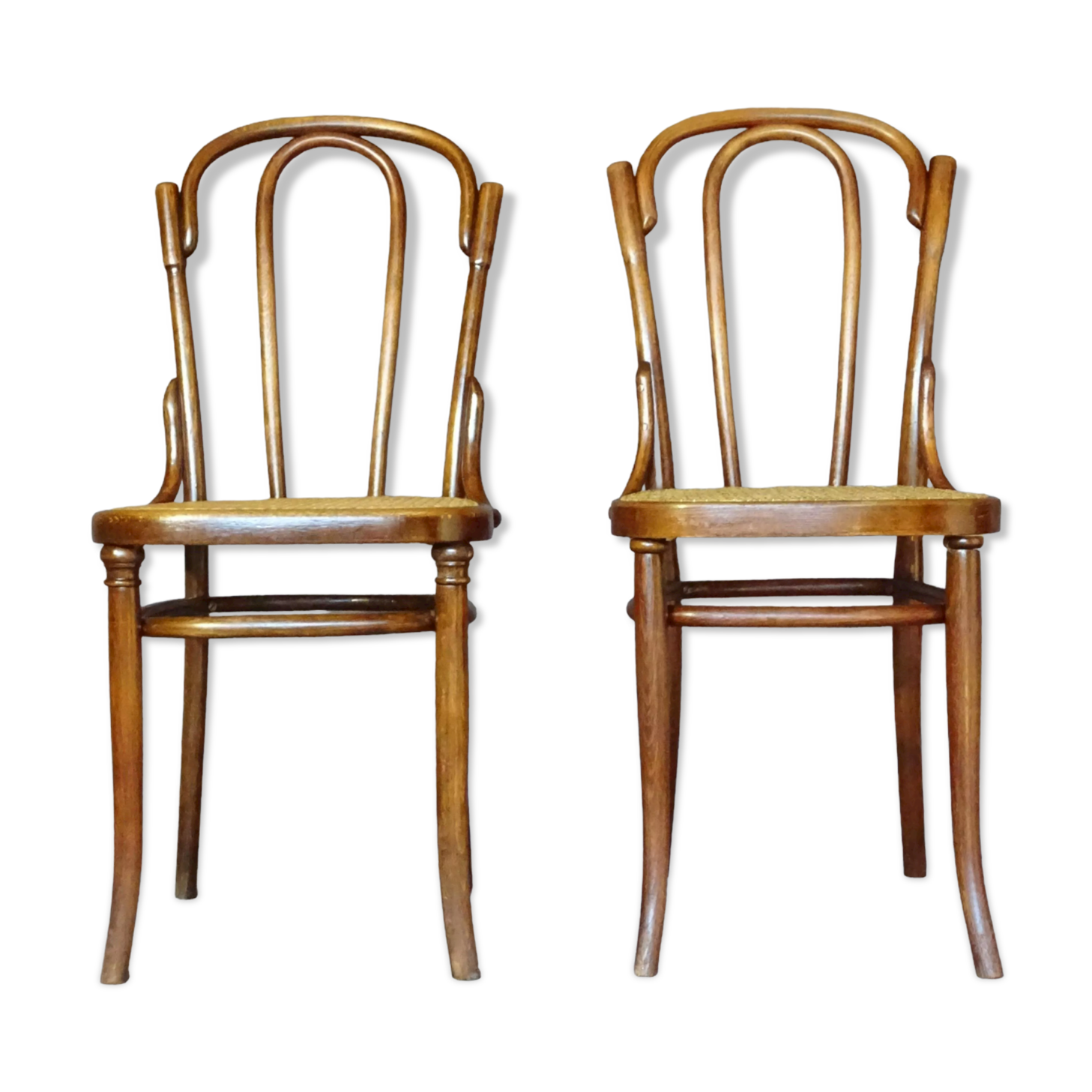 Fake pair of Kohn and Turpe tanned bistro chairs, circa 1900,