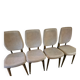 4 solid wood chairs with beige faux leather.