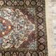 Handmade Persian carpet in wool and silk.