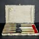 Ensemble de 12 couteaux vintage