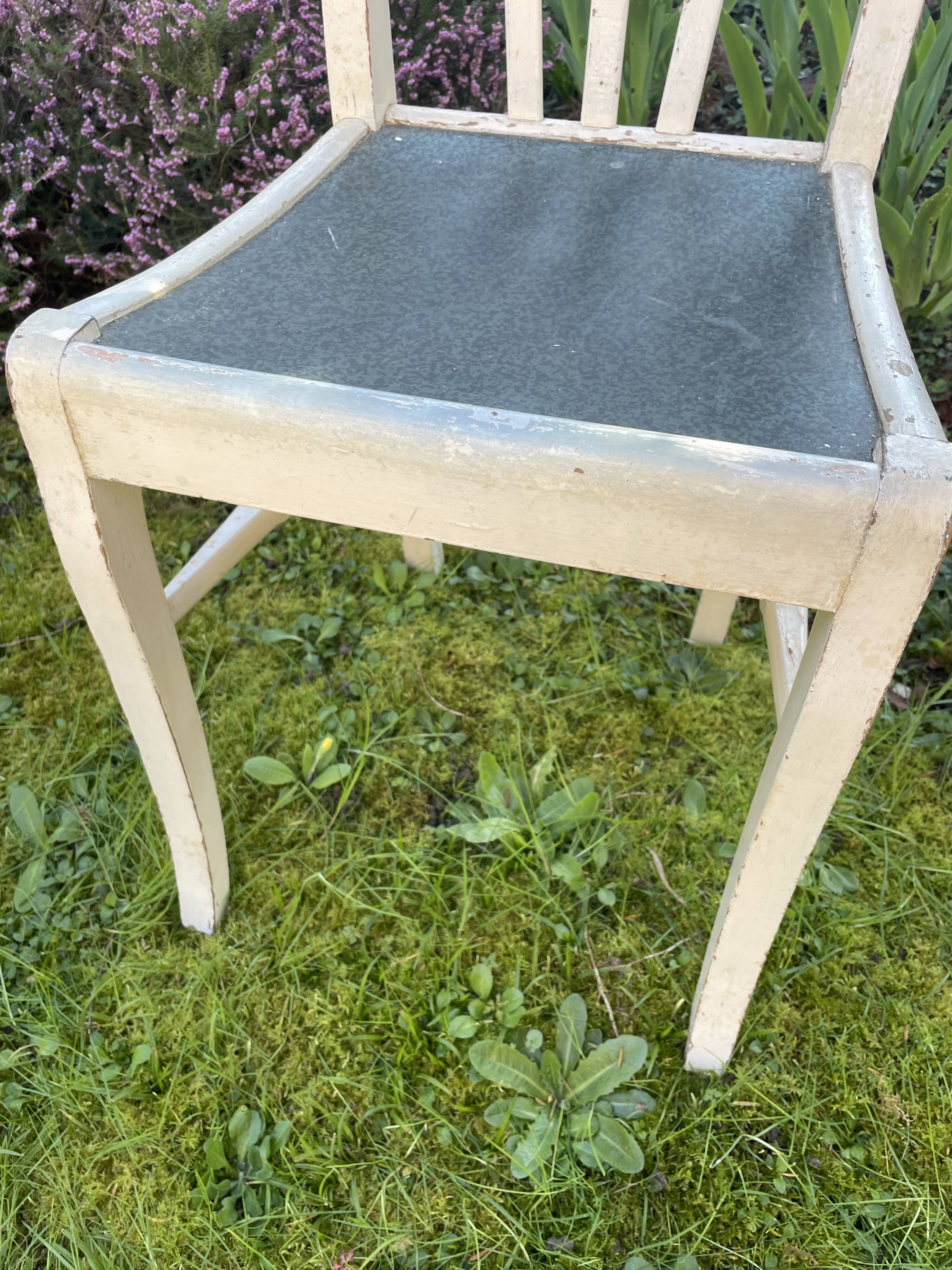 Four original 50 year retro white chairs