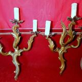 Pair of rococo style gilded bronze sconces with 3 light arms