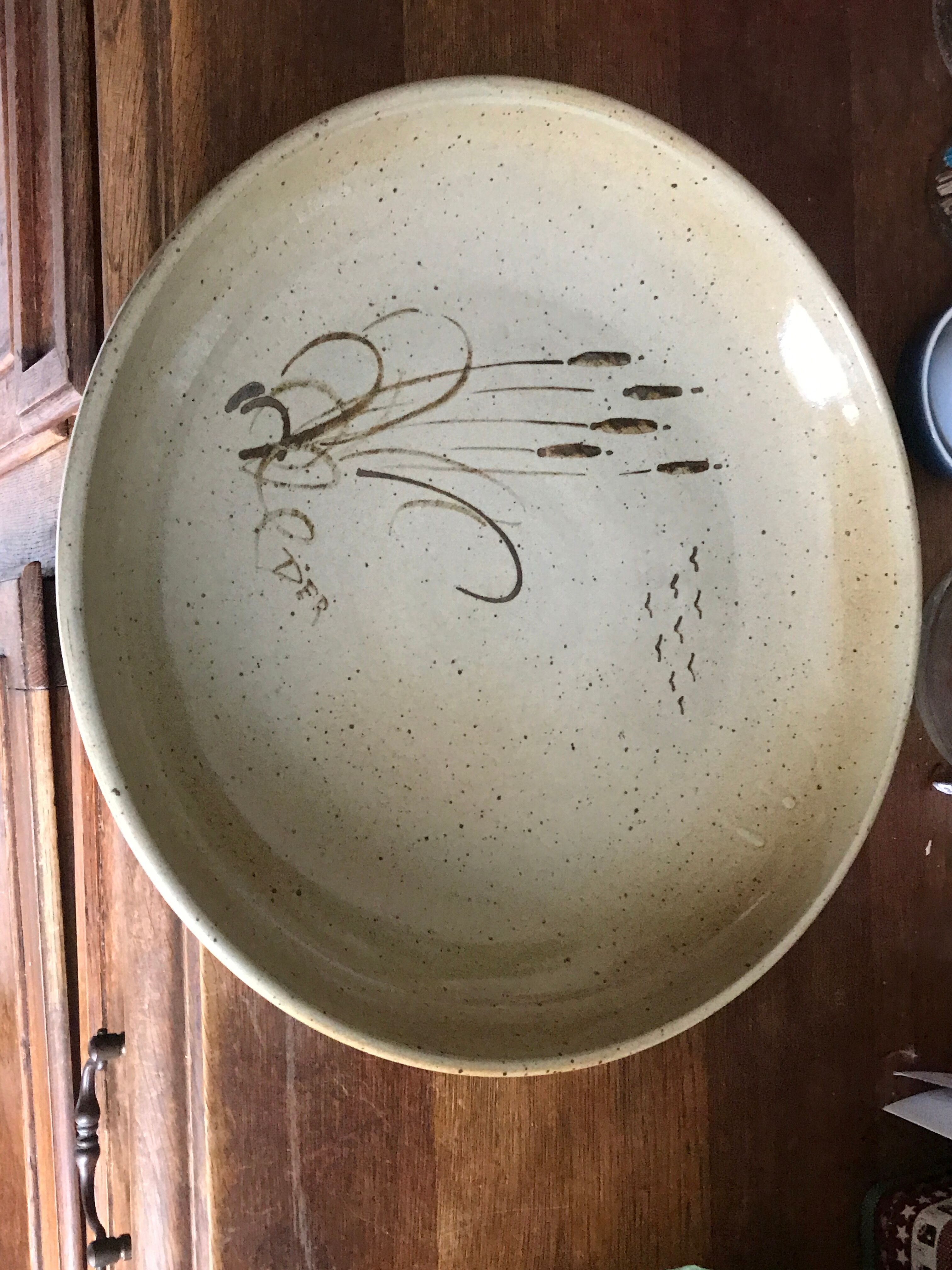 Large sandstone dish sign