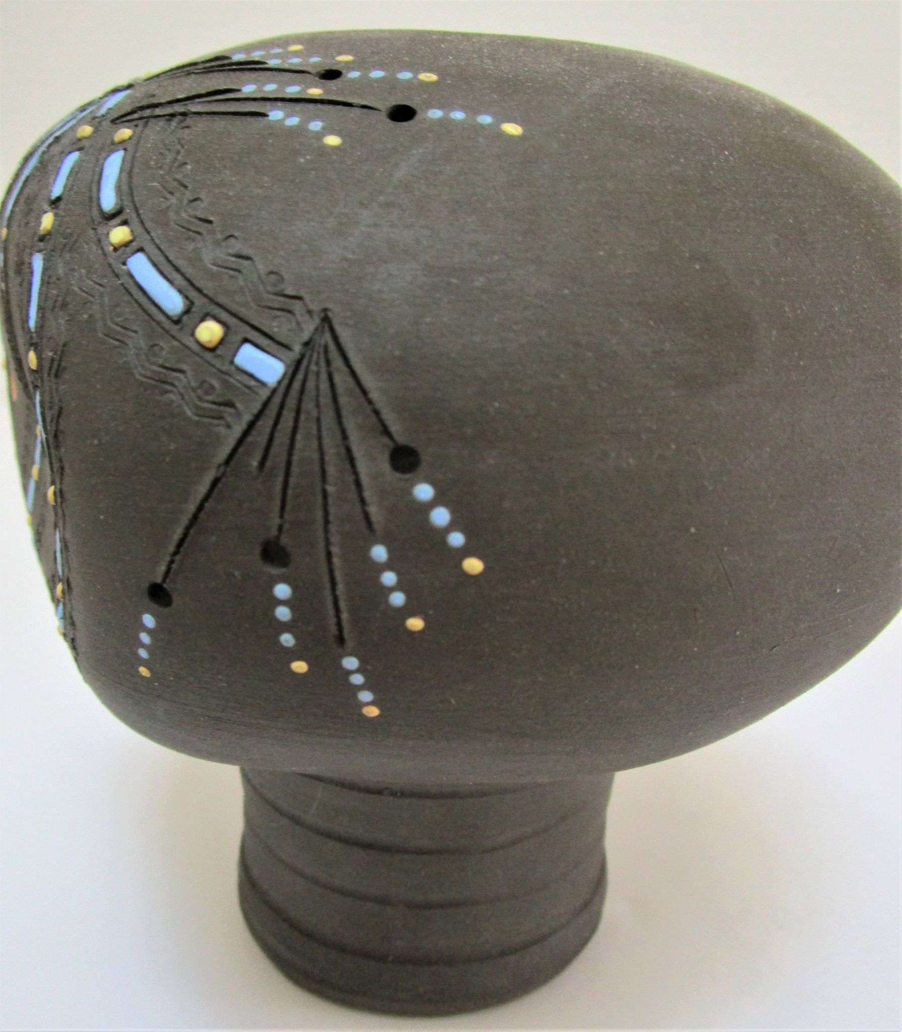 Anthropomorphic candle holder, scarified ceramic, stamped design