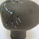 Anthropomorphic candle holder, scarified ceramic, stamped design