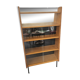 Modernist showcase library with sliding glass doors