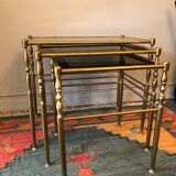 Brass tables and smoked glasses