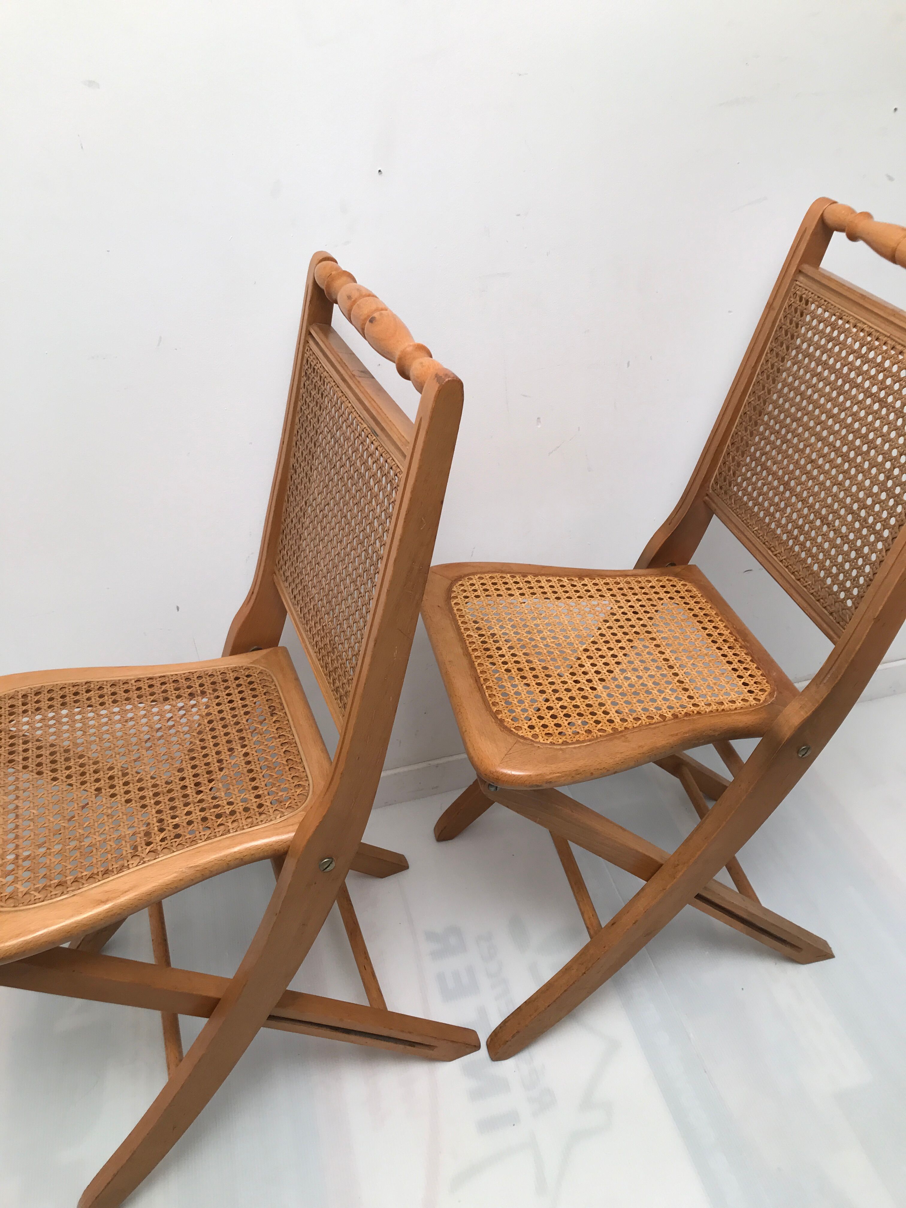 Pair vintage cannesy folding chairs