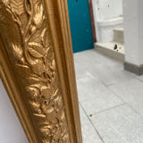 Large gilded patinated trumeau mirror