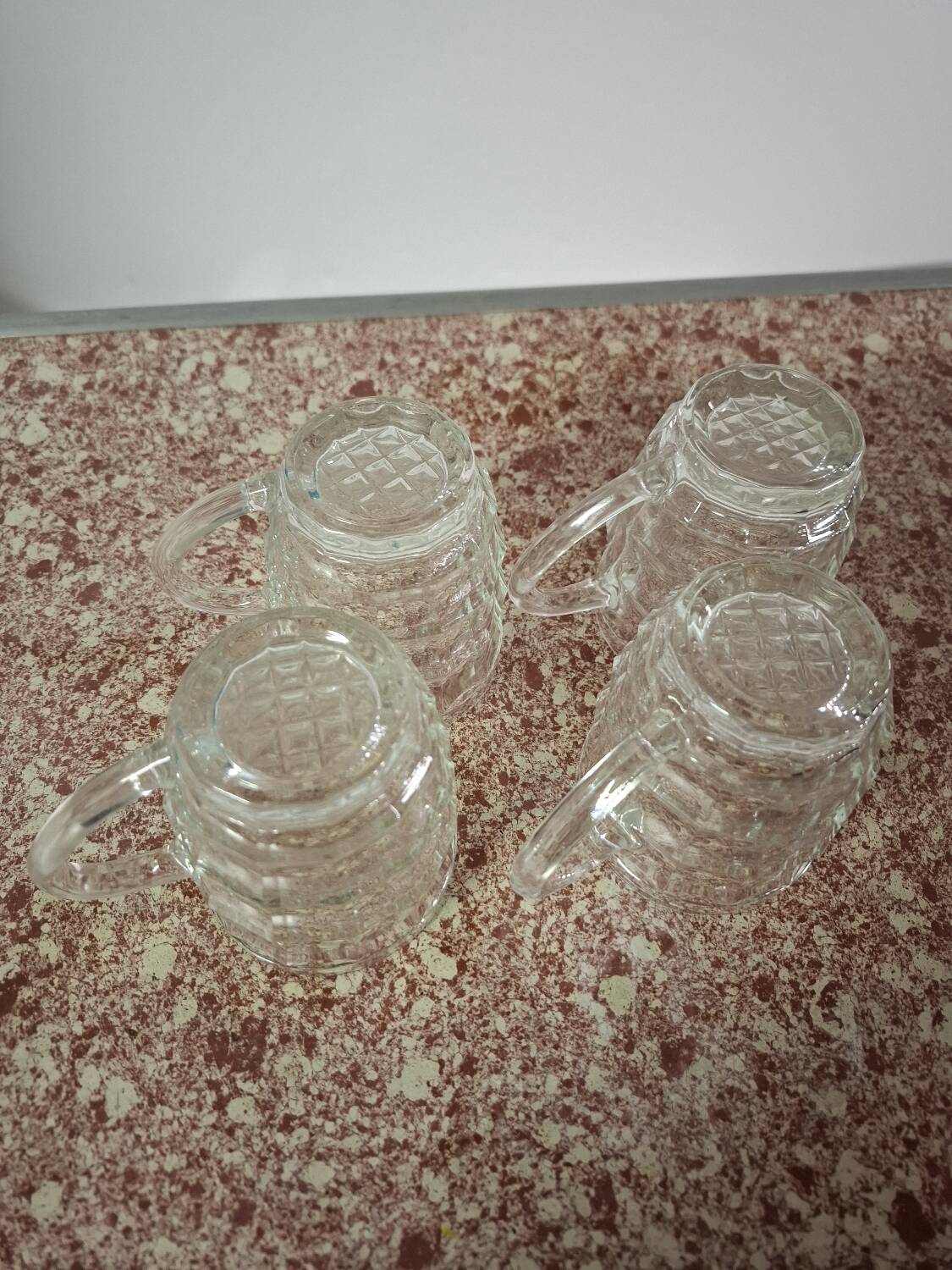 Set of four glass mugs