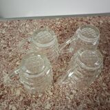Set of four glass mugs
