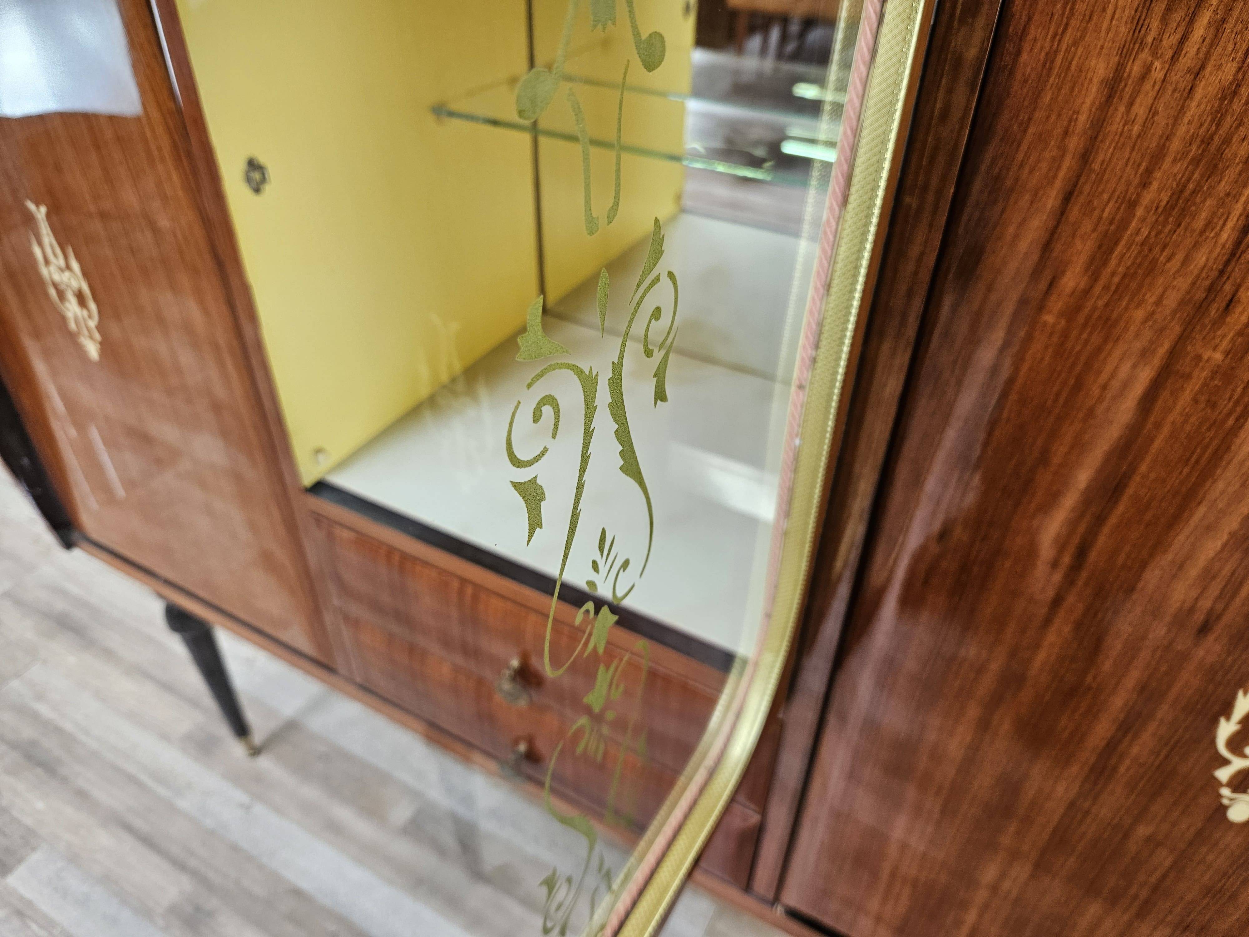 Mid-century 1960s mahogany showcase with glass top