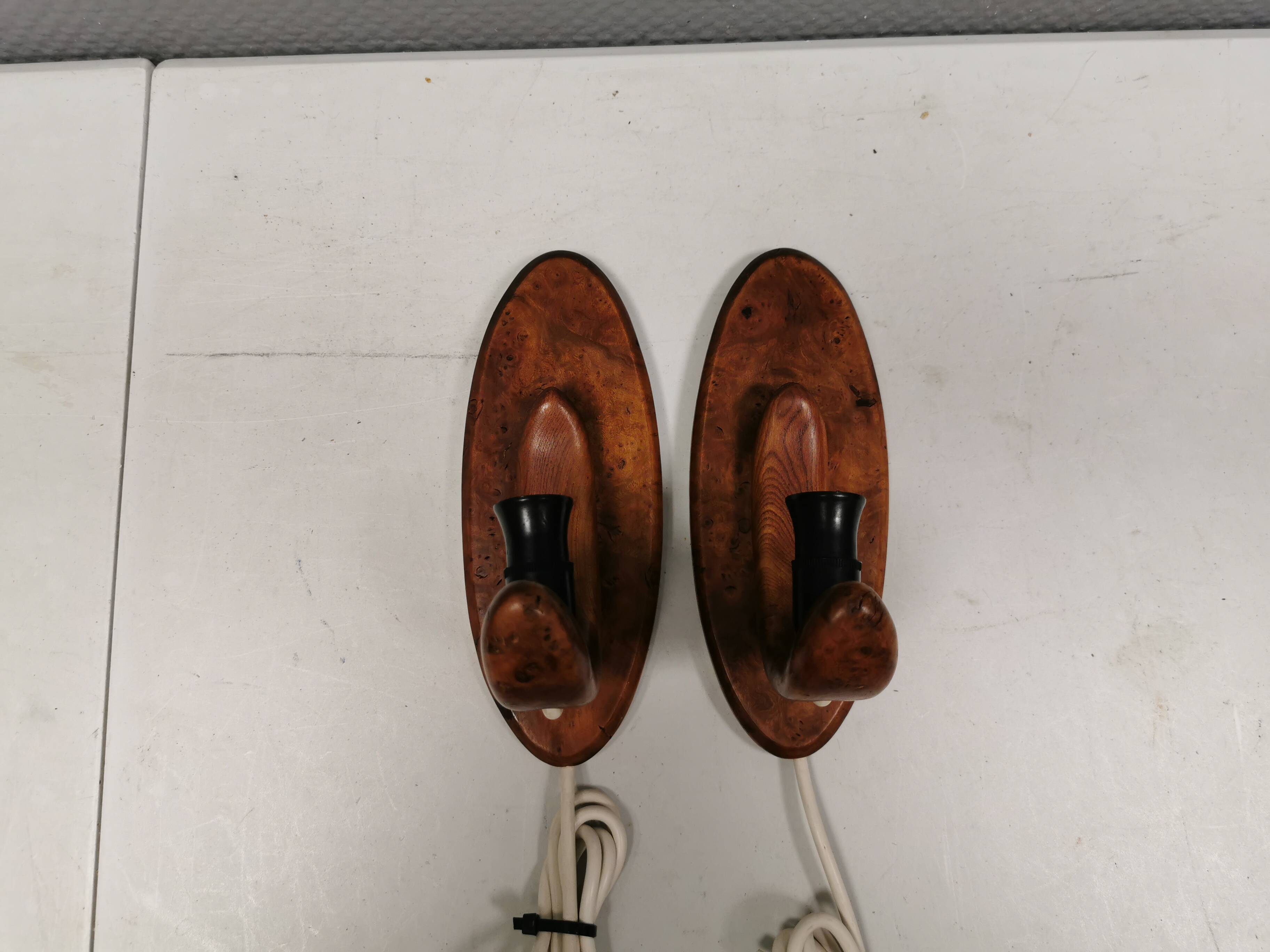 A set of old wall lamps in walnut.