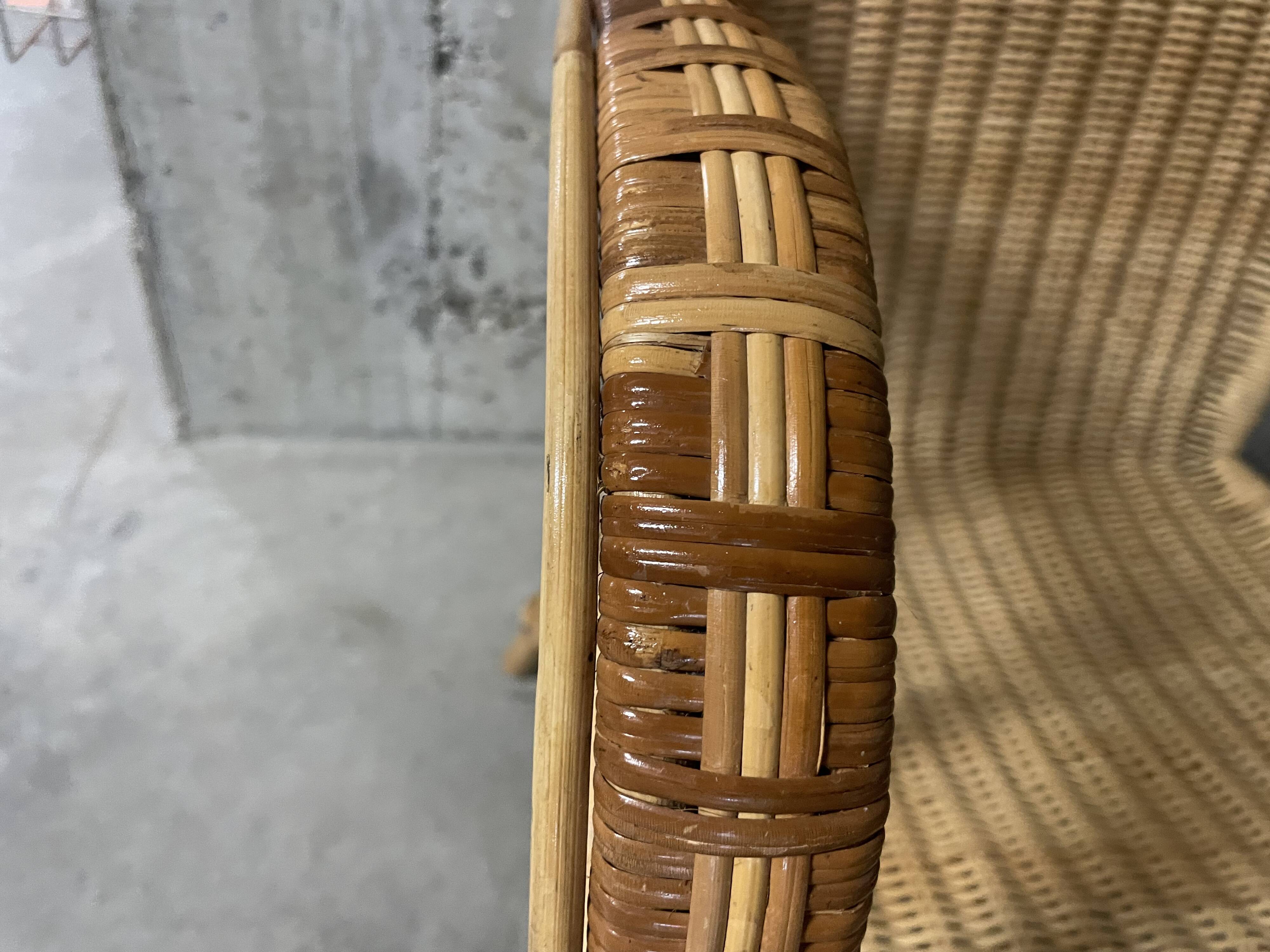 Rattan and wicker armchair from the 1970s.