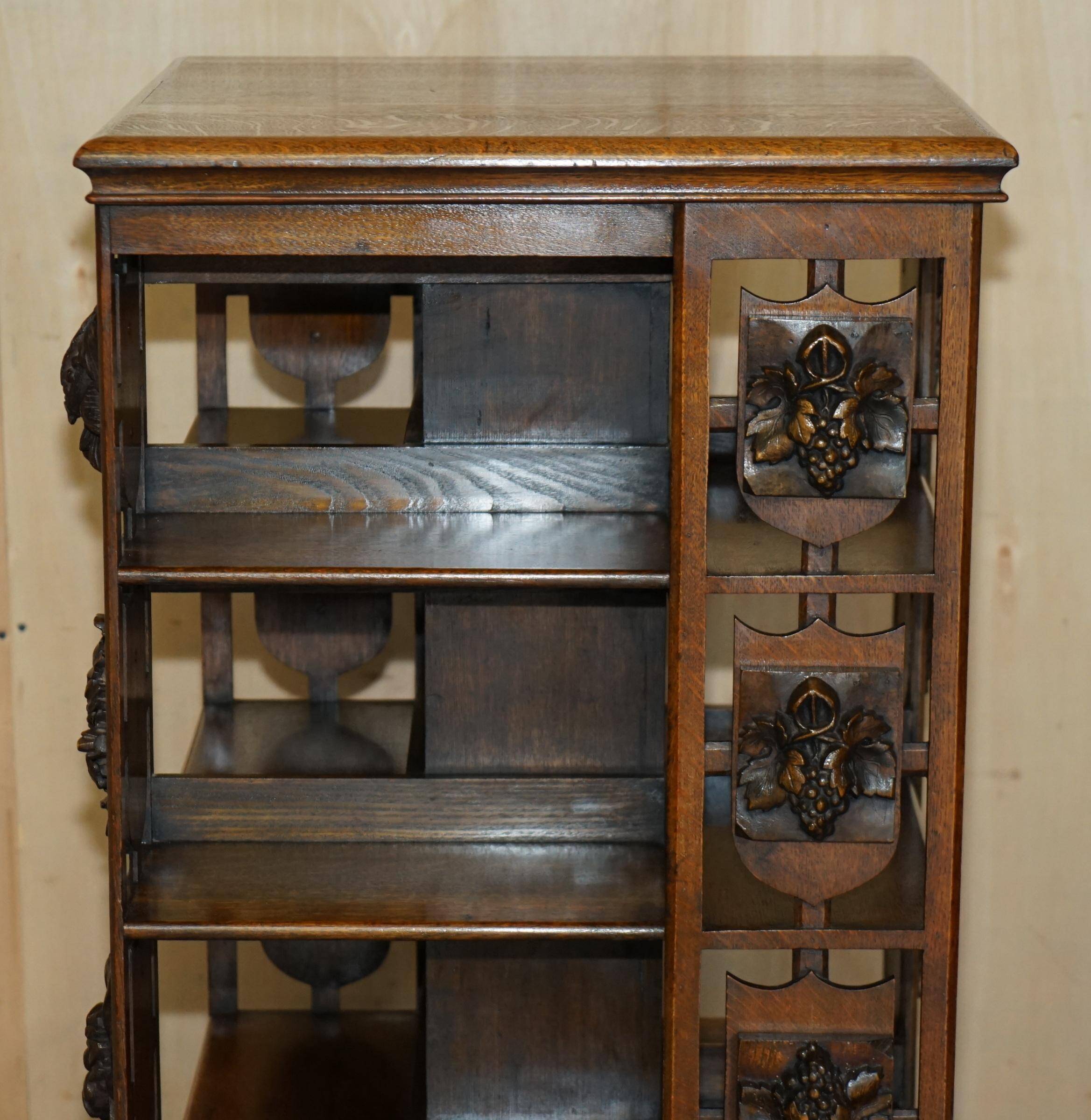 Antique Art Nouveau Victorian hand-carved revolving library.
