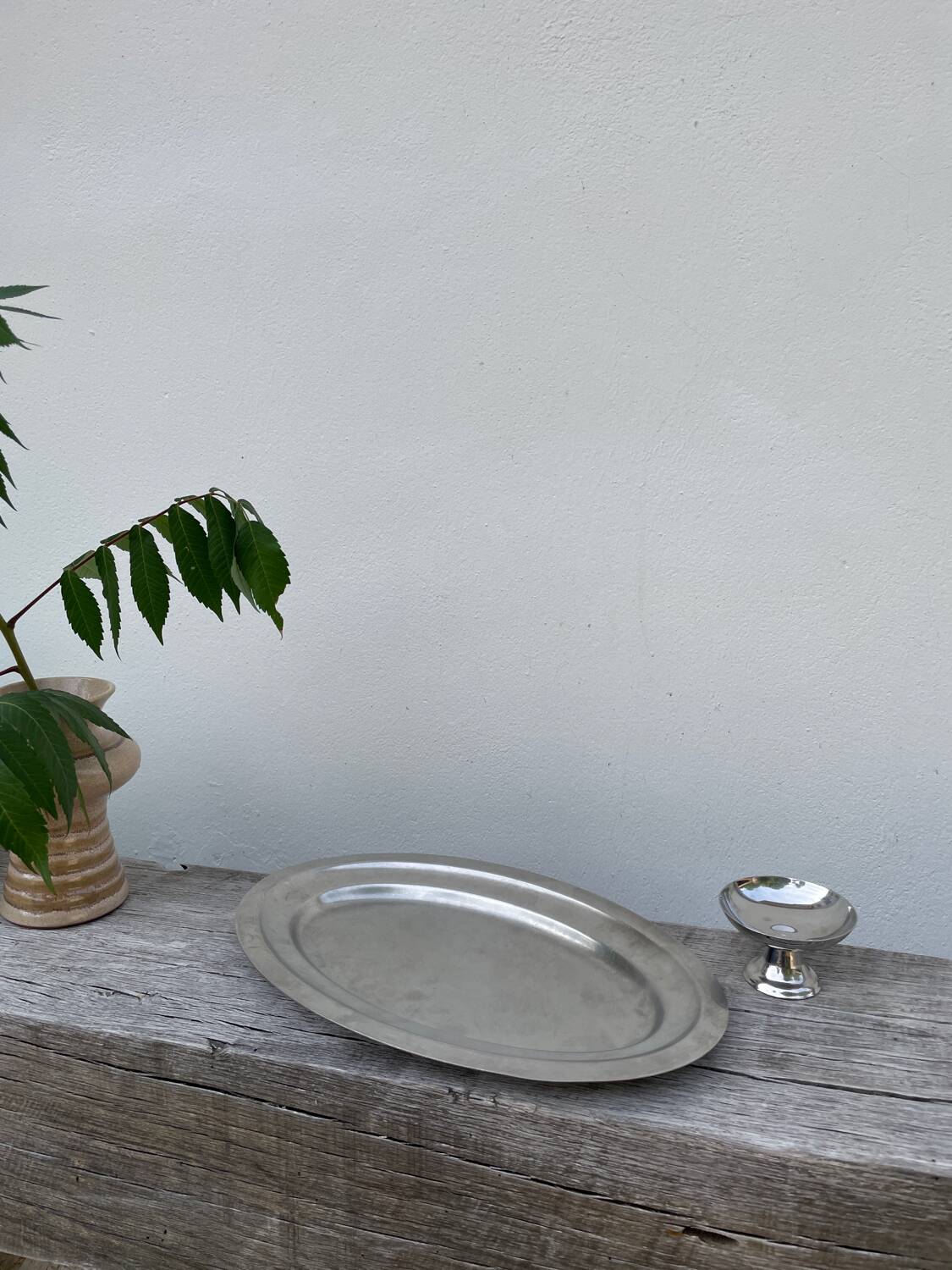 Oval stainless steel dish, signed Rémi Letang