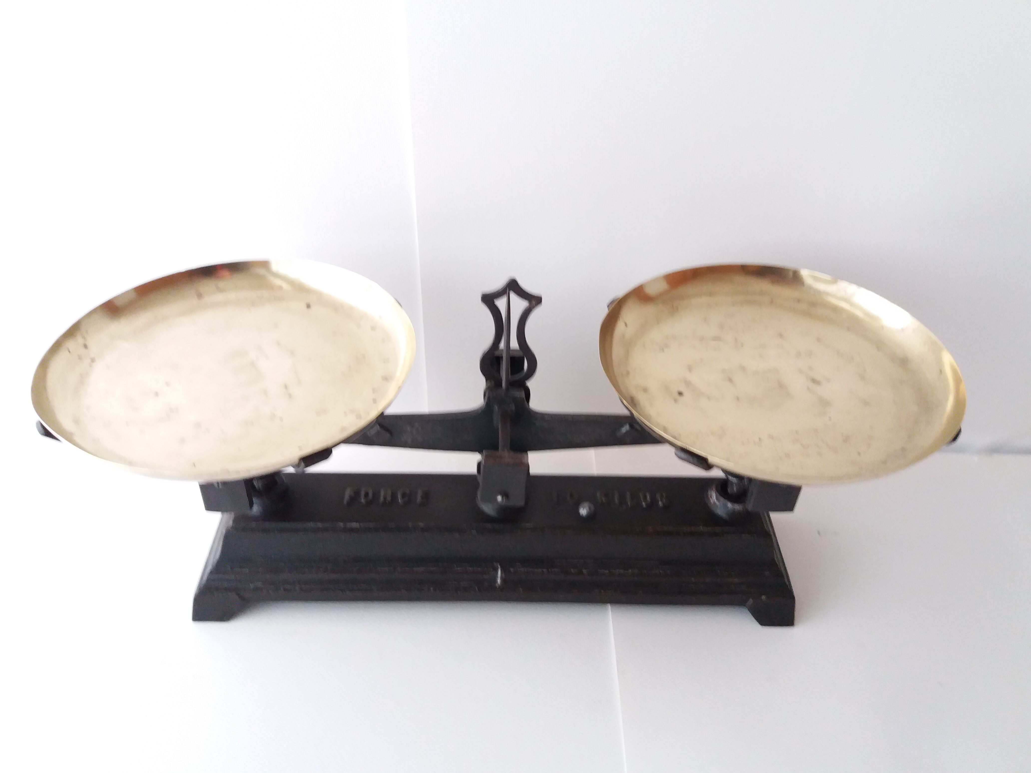 Cast iron and brass balance