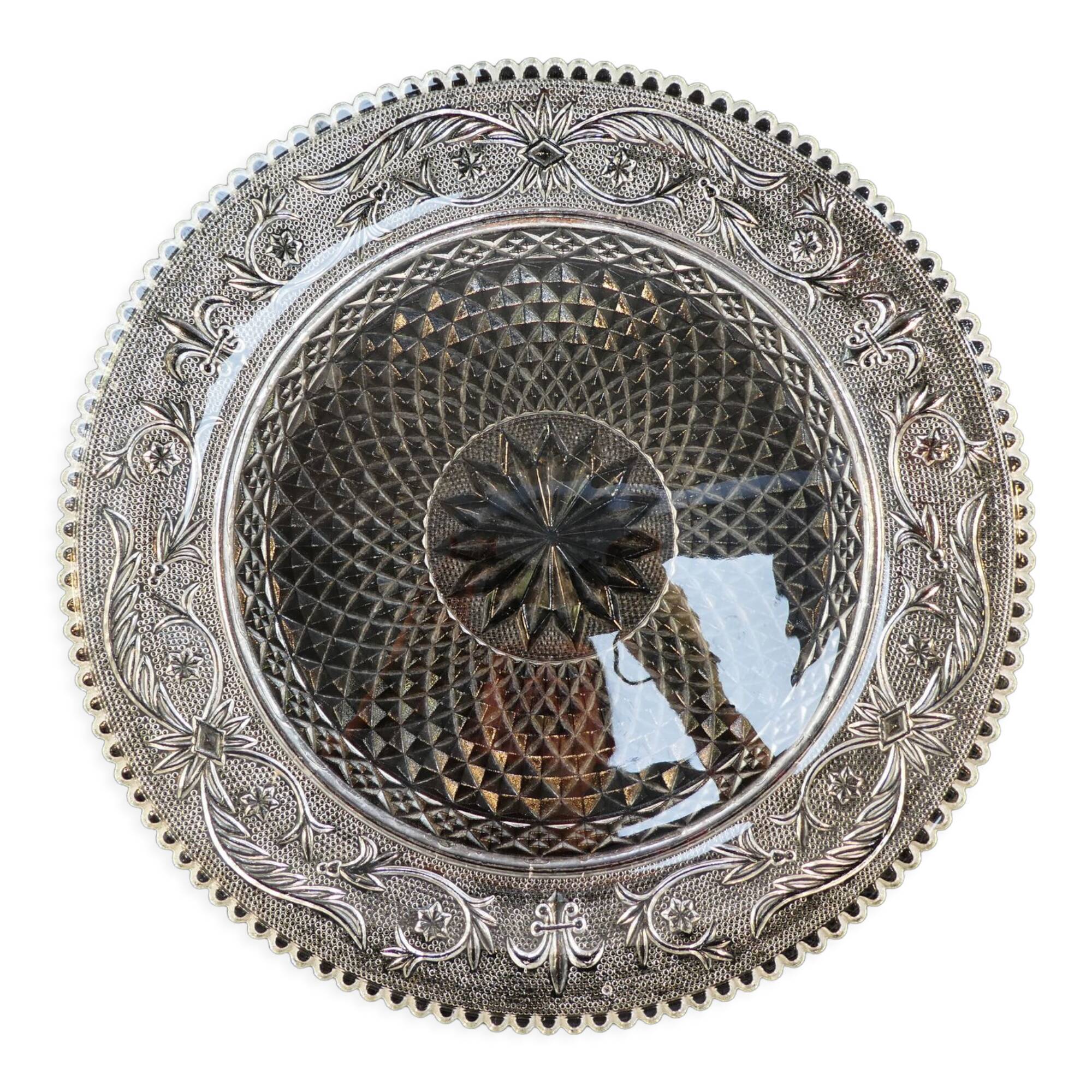 Old plate with pressed glass arabesque pie