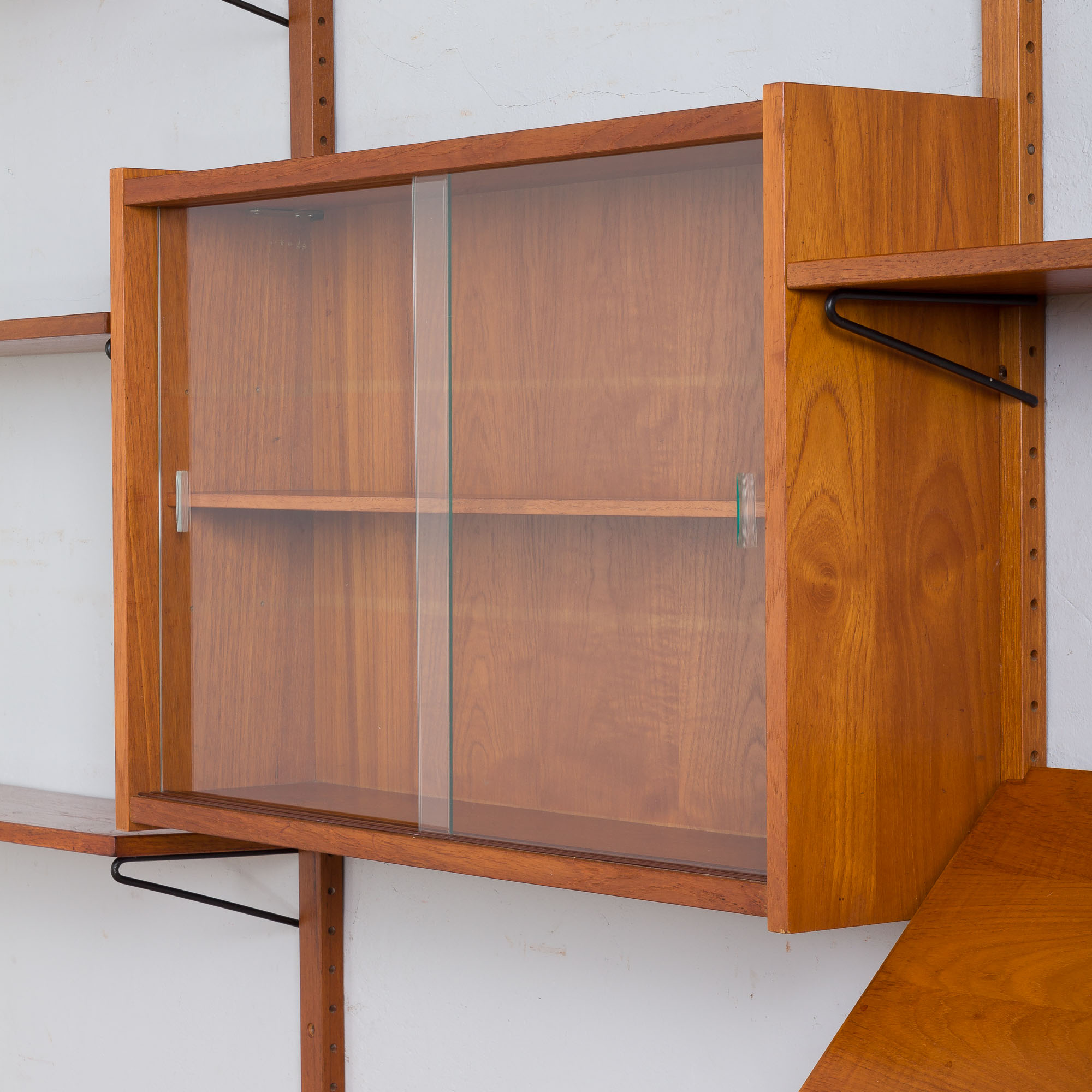 Danish mid century teak wall unit with magazine shelf and glass cabinet 1960/70s