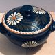 Alsatian pottery soup decorated with white flowers and green arabesques motifs