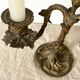 Pair of antique bronze candlesticks at the end of the table XIXth
