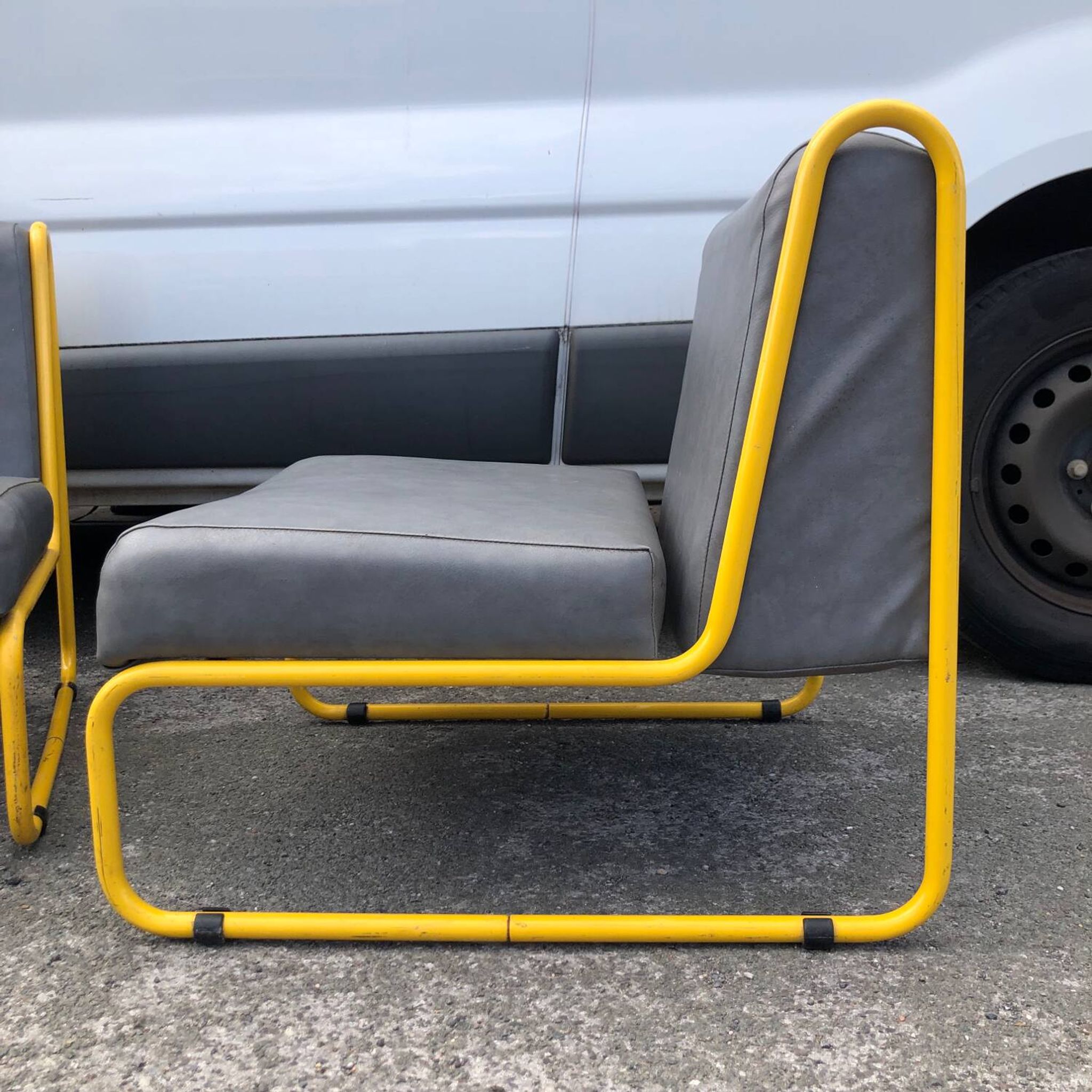 Pair of designer armchairs by Henri Julien