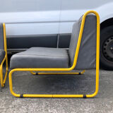 Pair of designer armchairs by Henri Julien