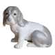 Small spaniel dog in porcelain