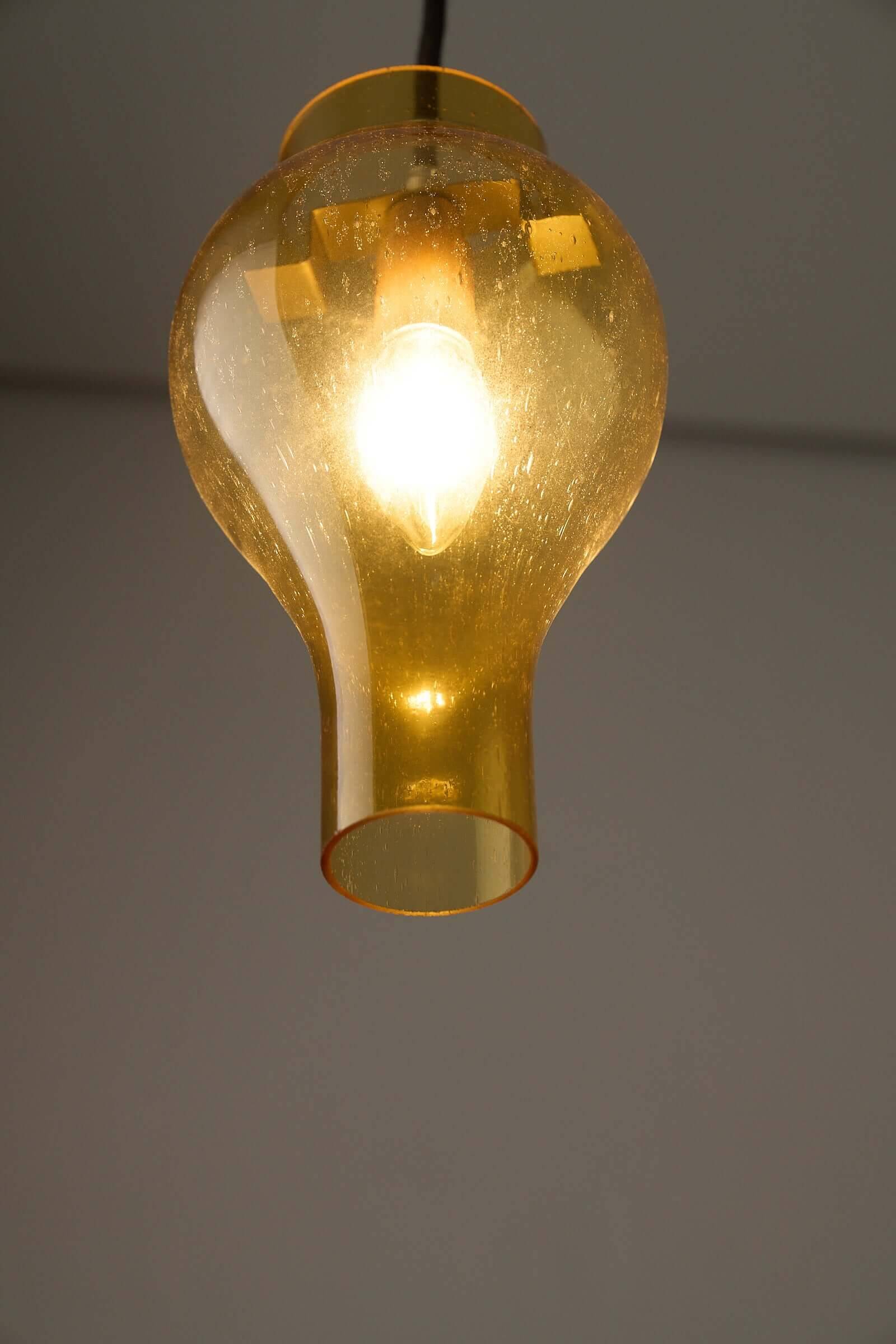 Yellow glass pendant lamp with bubbles