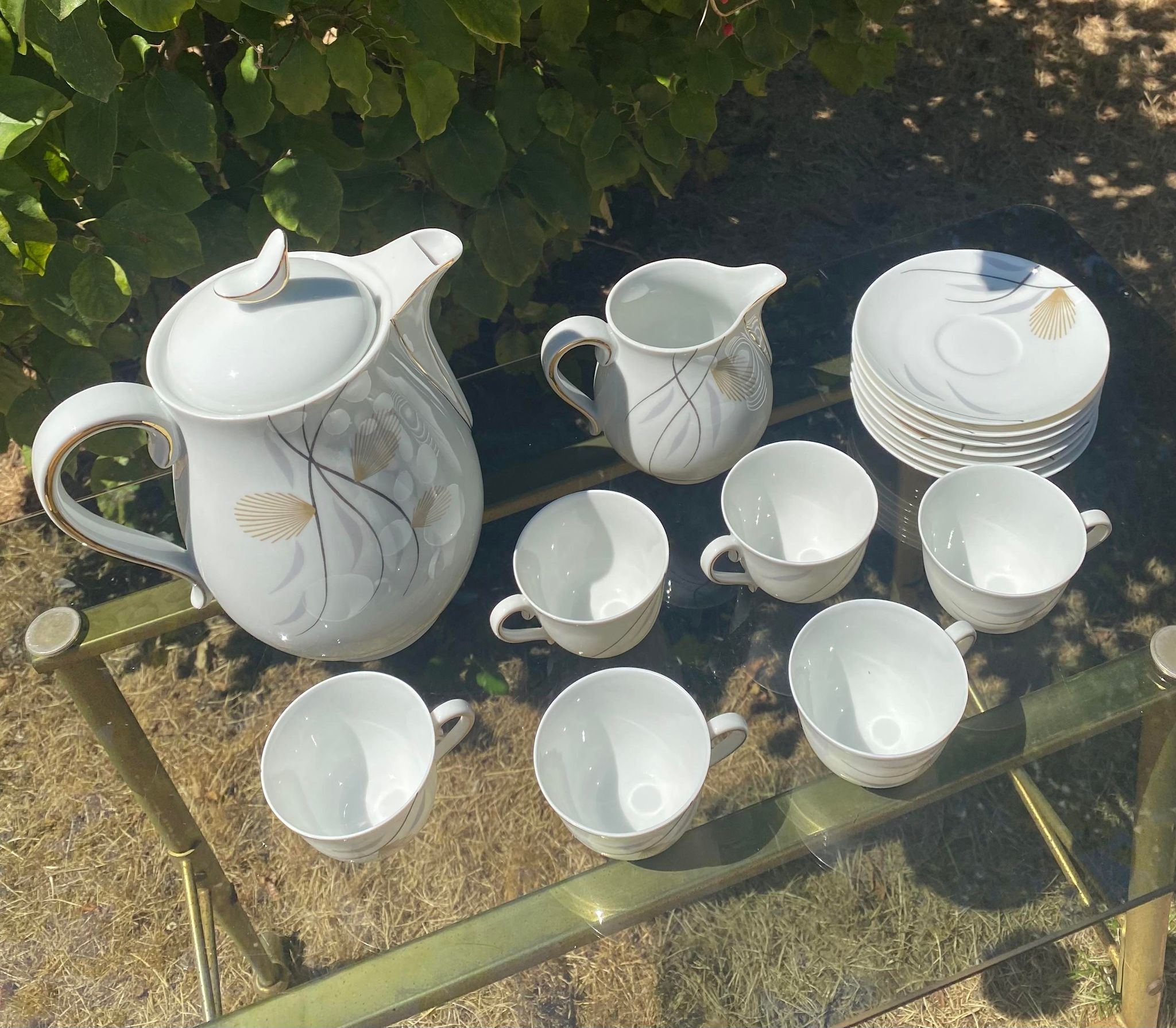 Porcelain coffee service by Charles Ahrenfeldt from Limoges France