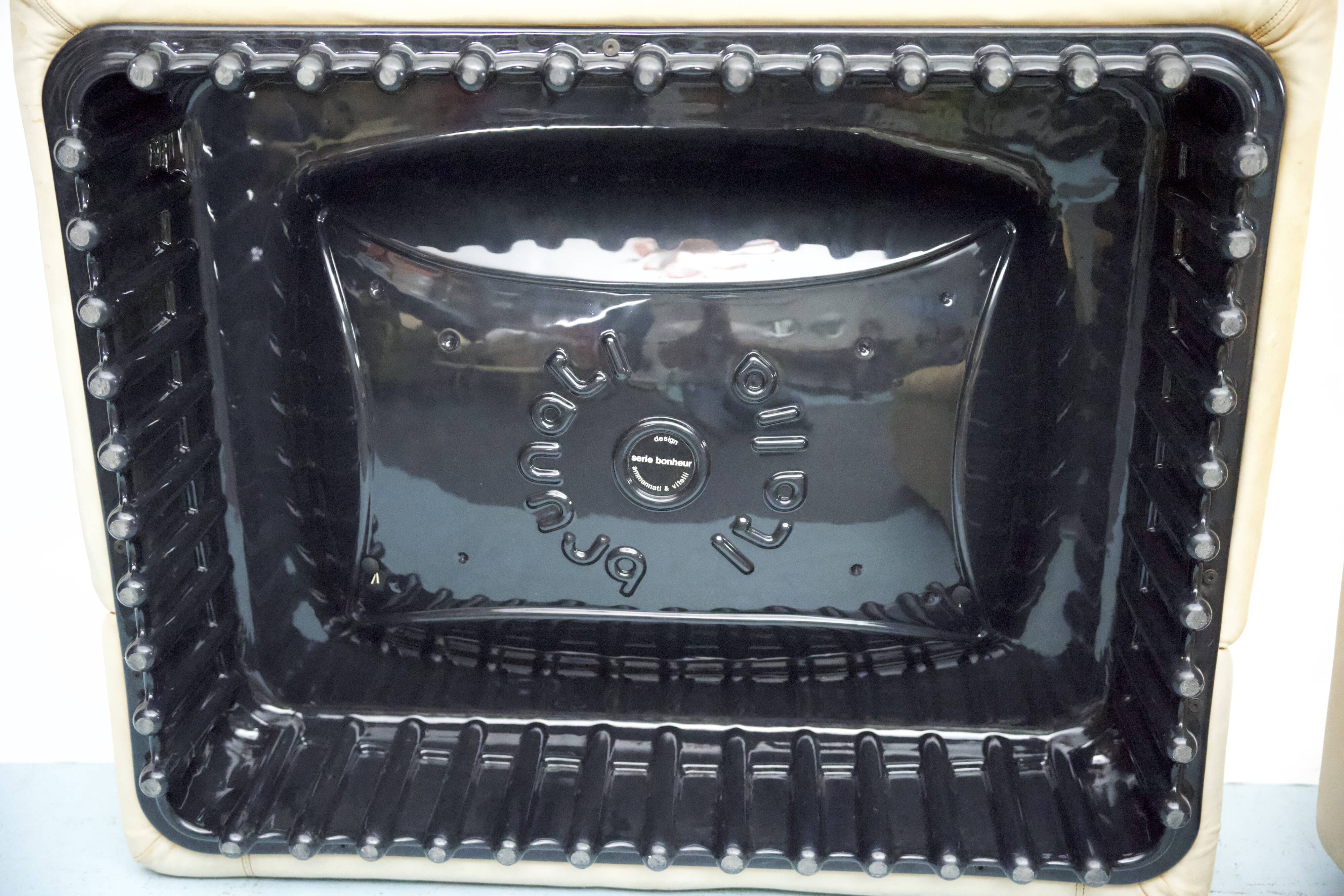 Vintage pair of leather armchairs by Ammannati and Vitelli for Brunati, Italy 1970s.