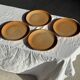 Set of 4 flat dinner plates in stoneware, no brand underneath.