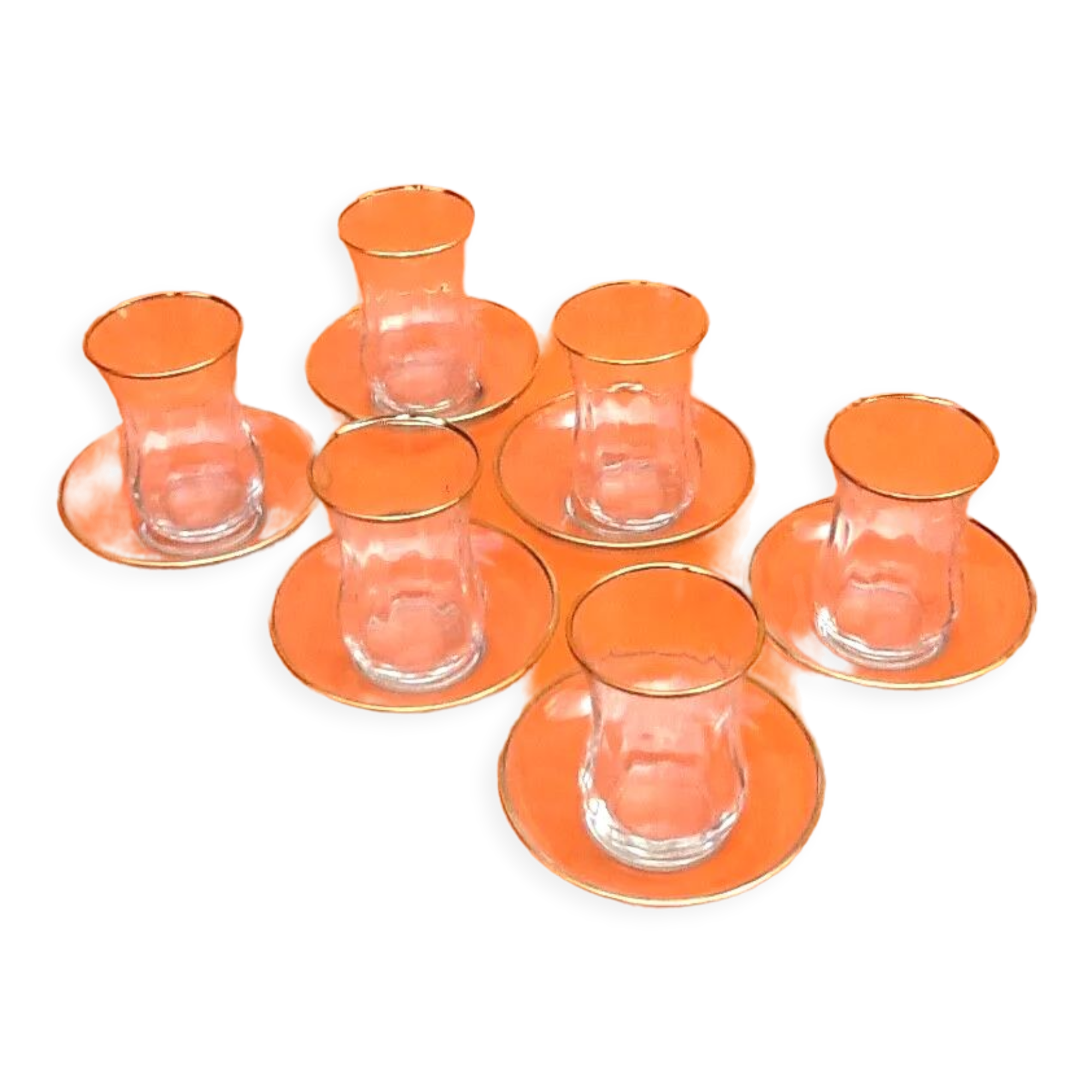 Transparent glass tea service with gilding.